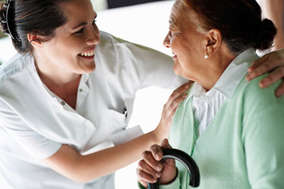 Nurse helping patient